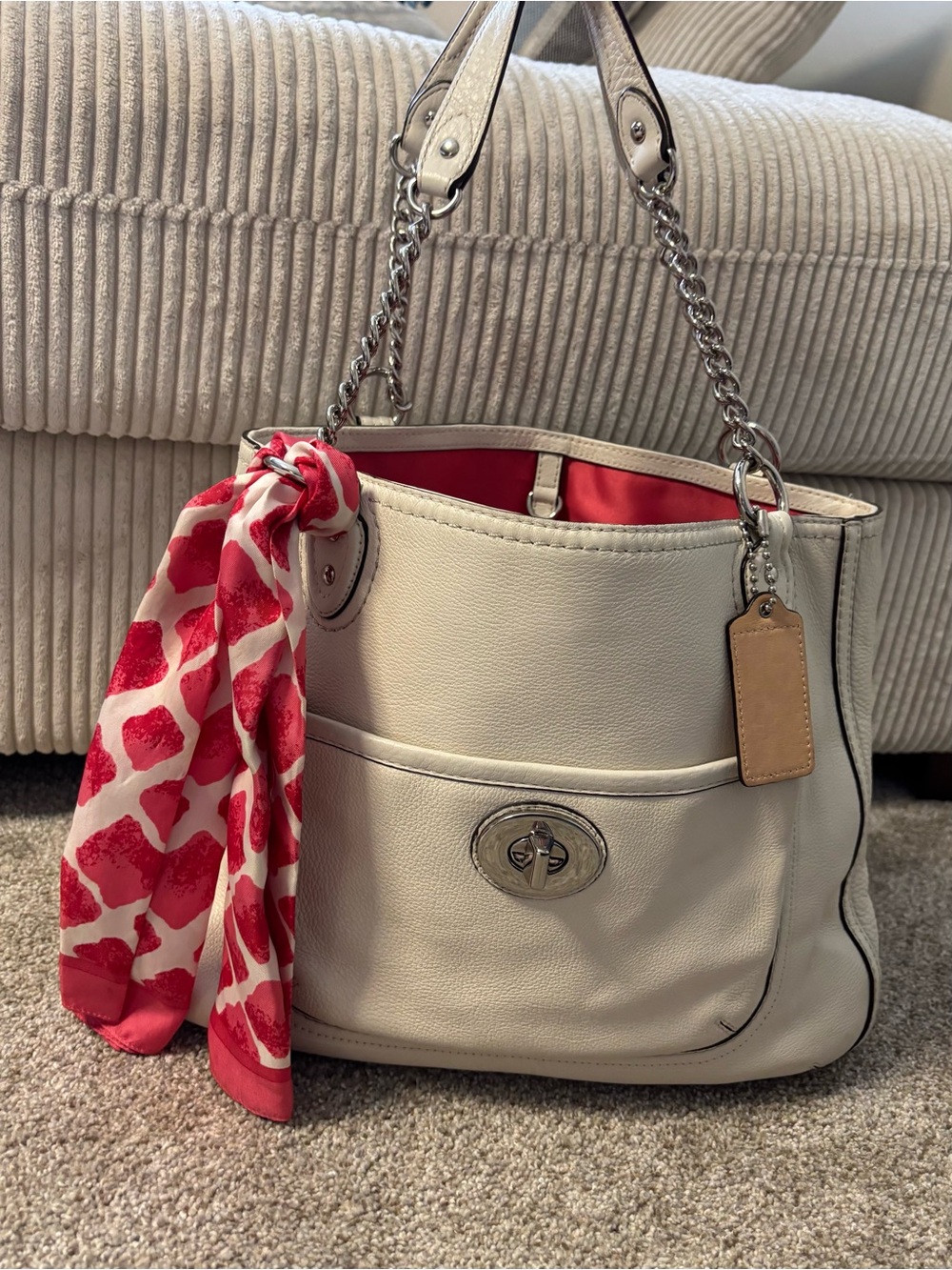 Coach off white pebbled leather purse pink lining